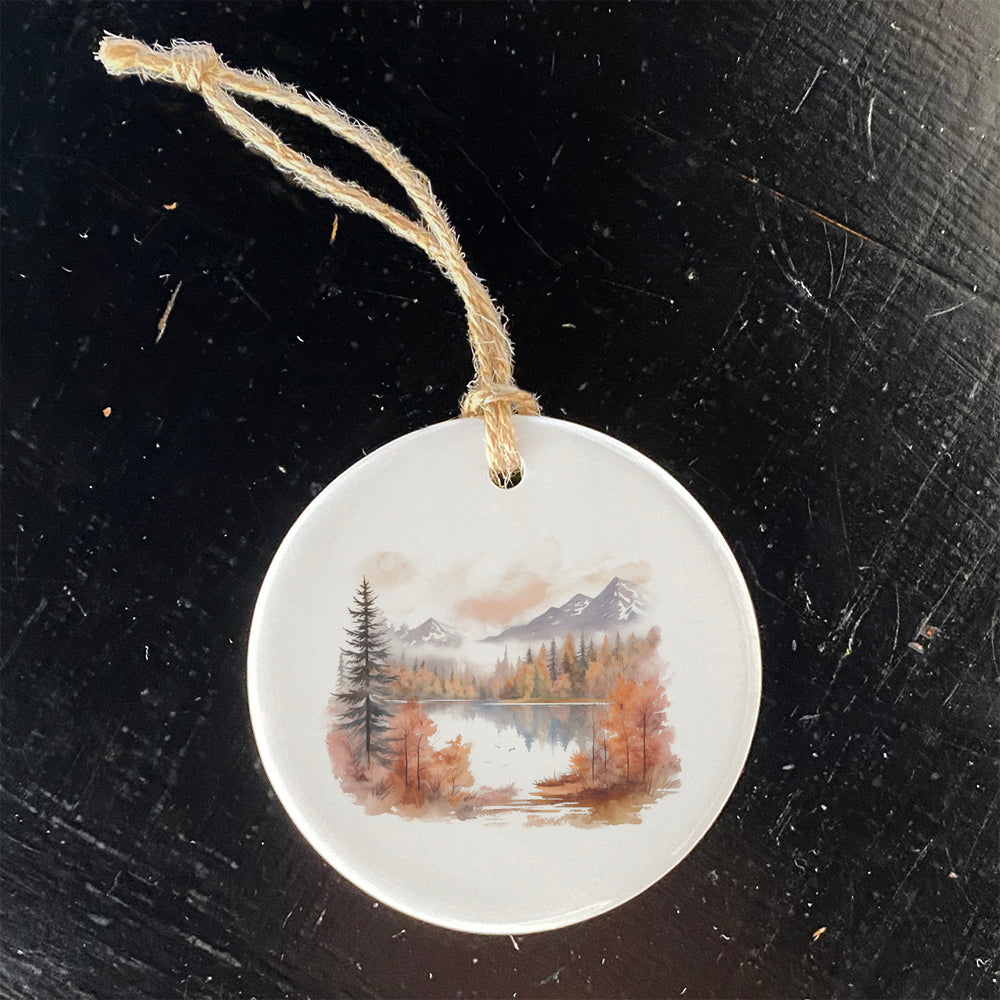 A beautifully crafted porcelain ornament featuring an Autumn Lake Scene design, showcasing vibrant colors and a smooth gloss finish.