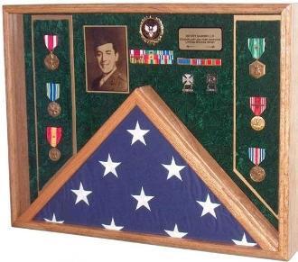 Elegant oak awards and flag display case showcasing military honors and a burial flag.