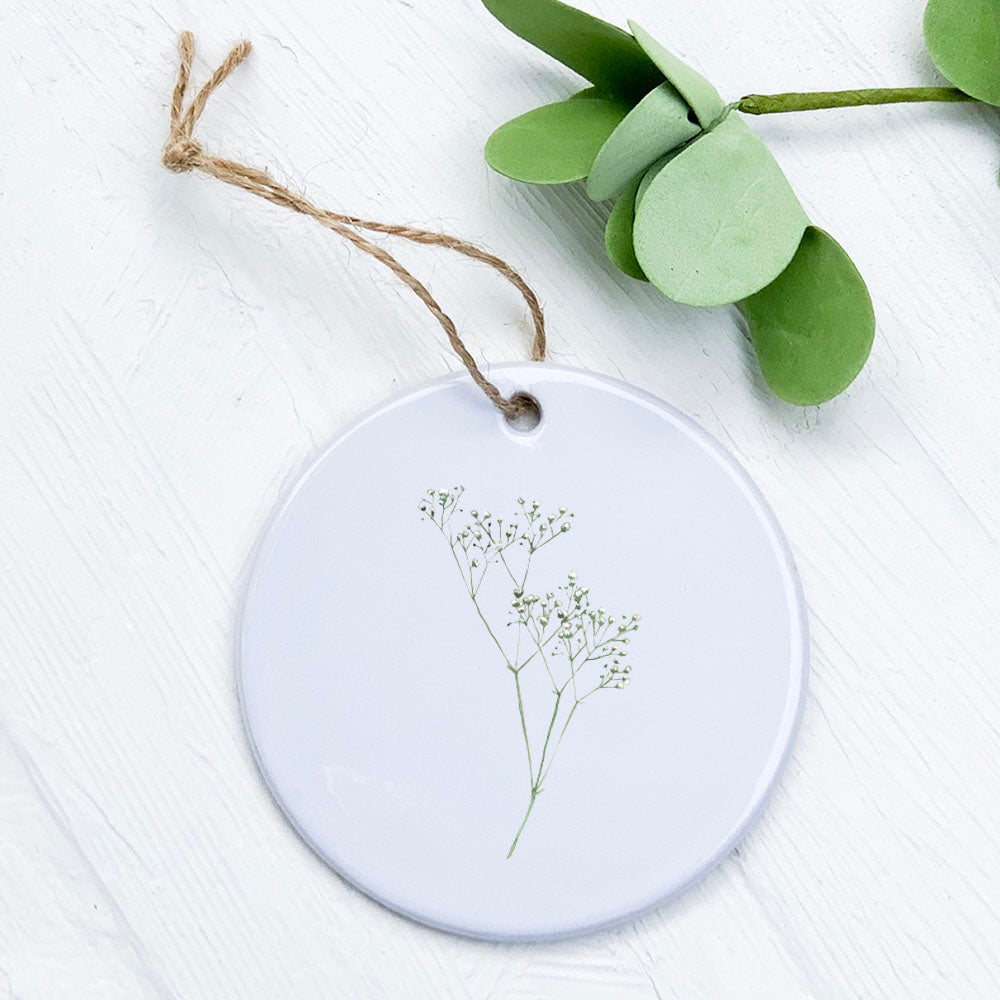 A beautifully crafted Baby's Breath porcelain ornament featuring original designs, perfect for gifts and home decor.