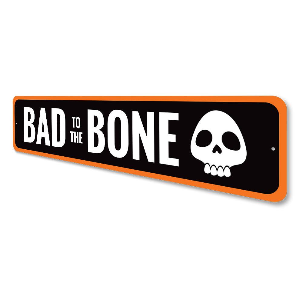 Bad to the Bone Sign featuring spooky lettering on a high-quality aluminum background, perfect for Halloween decor.