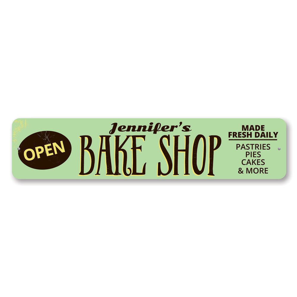 A decorative Bake Shop Open Sign made of high-quality aluminum, featuring customizable text and pre-drilled holes for easy mounting.