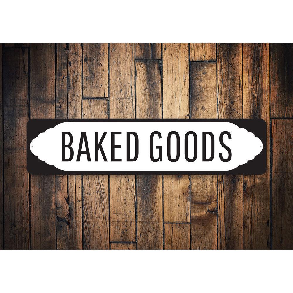 A decorative Baked Goods Sign made of high-quality aluminum, featuring vibrant colors and customizable text, perfect for kitchens and bakeries.