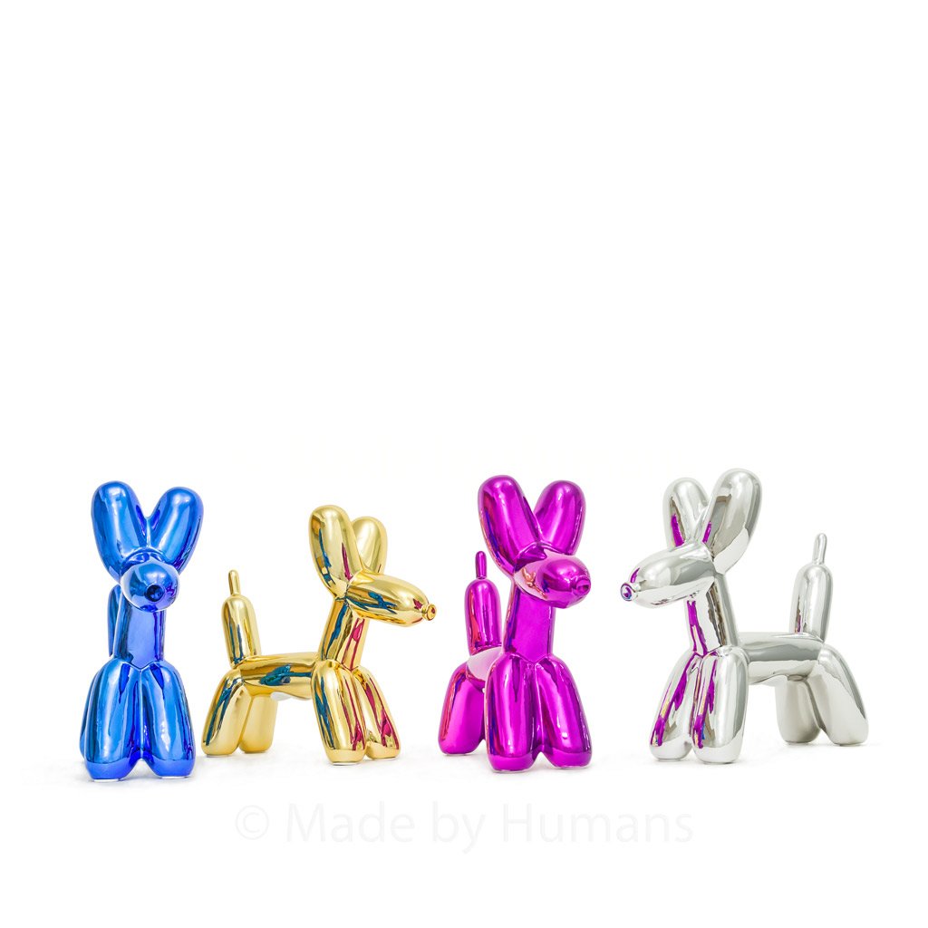 A glossy balloon dog money bank in vibrant colors, showcasing its playful design and high-gloss ceramic finish.