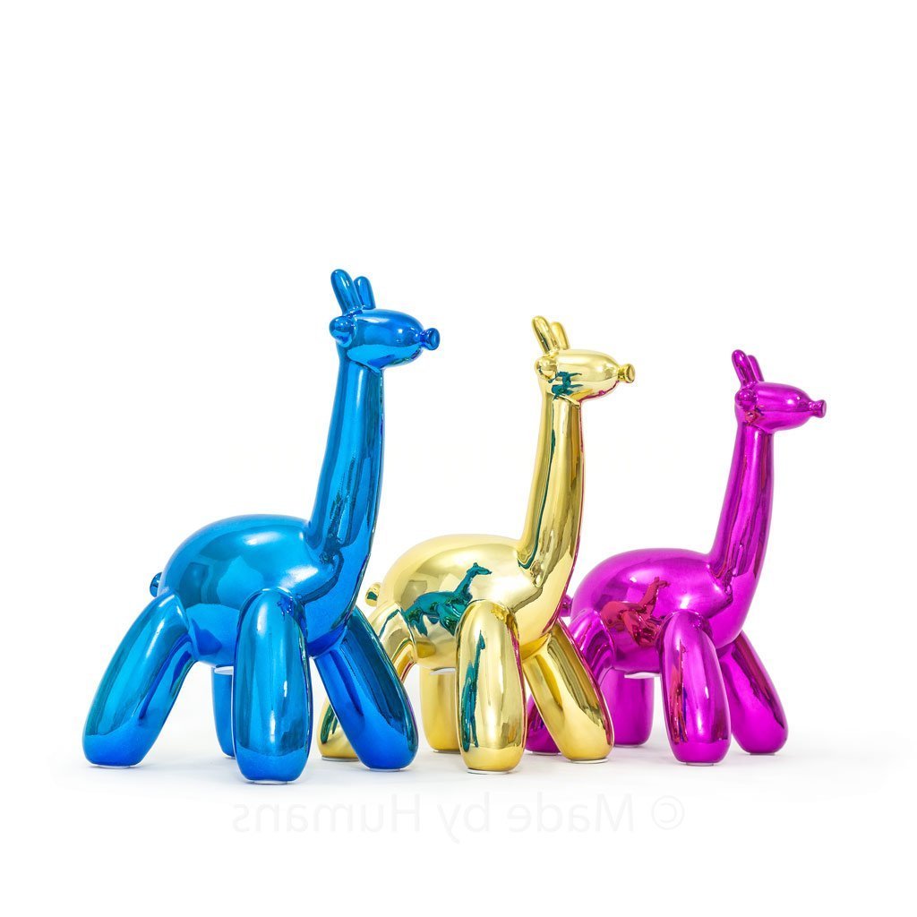 A stylish Balloon Money Bank shaped like a giraffe, featuring a glossy metallic finish in blue, gold, and pink colors, perfect for saving coins.