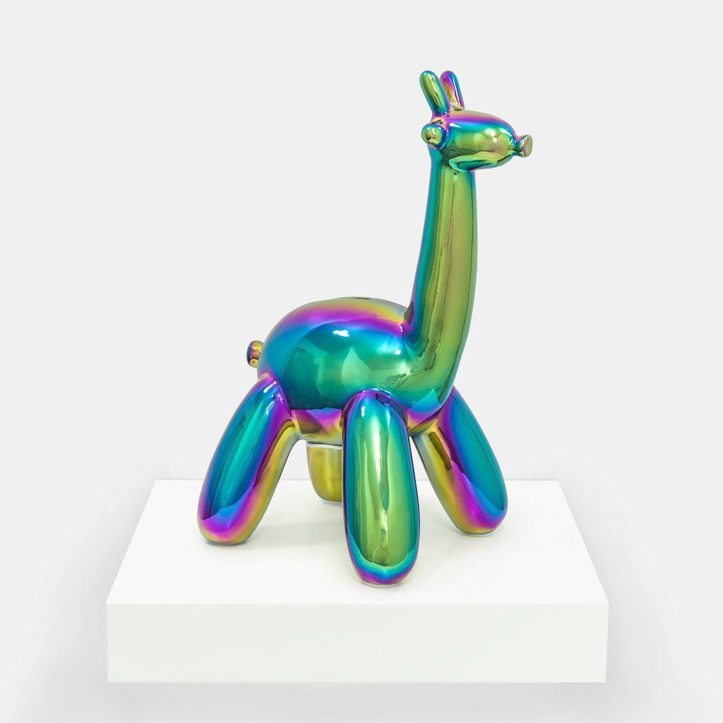 A stylish Balloon Money Bank shaped like a giraffe, featuring a glossy metallic finish in blue, gold, and pink colors, perfect for saving coins.