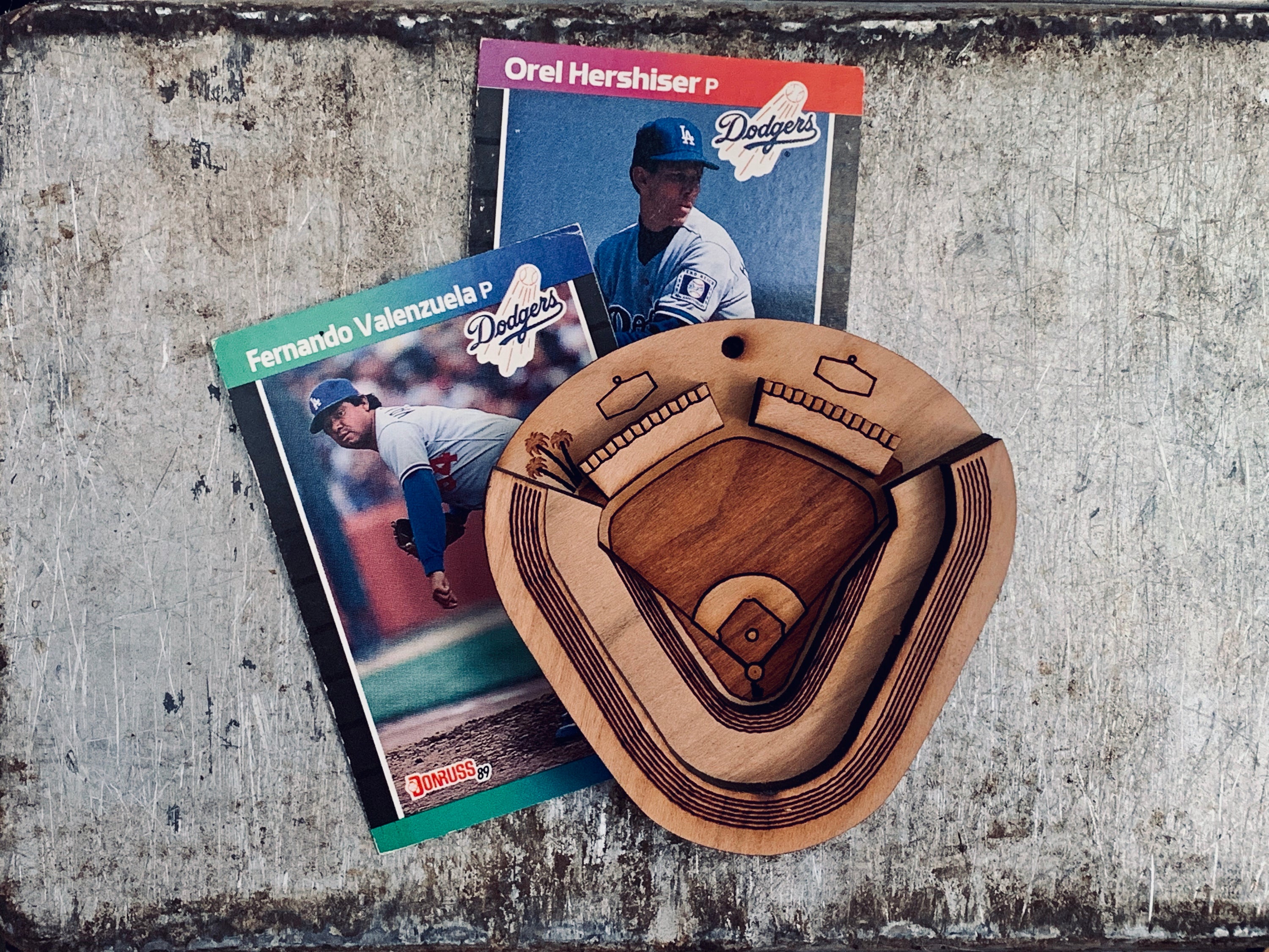 A set of Ballpark Magnets made from cherry hardwood, featuring strong ceramic magnets, displayed in an engraved craft gift box.