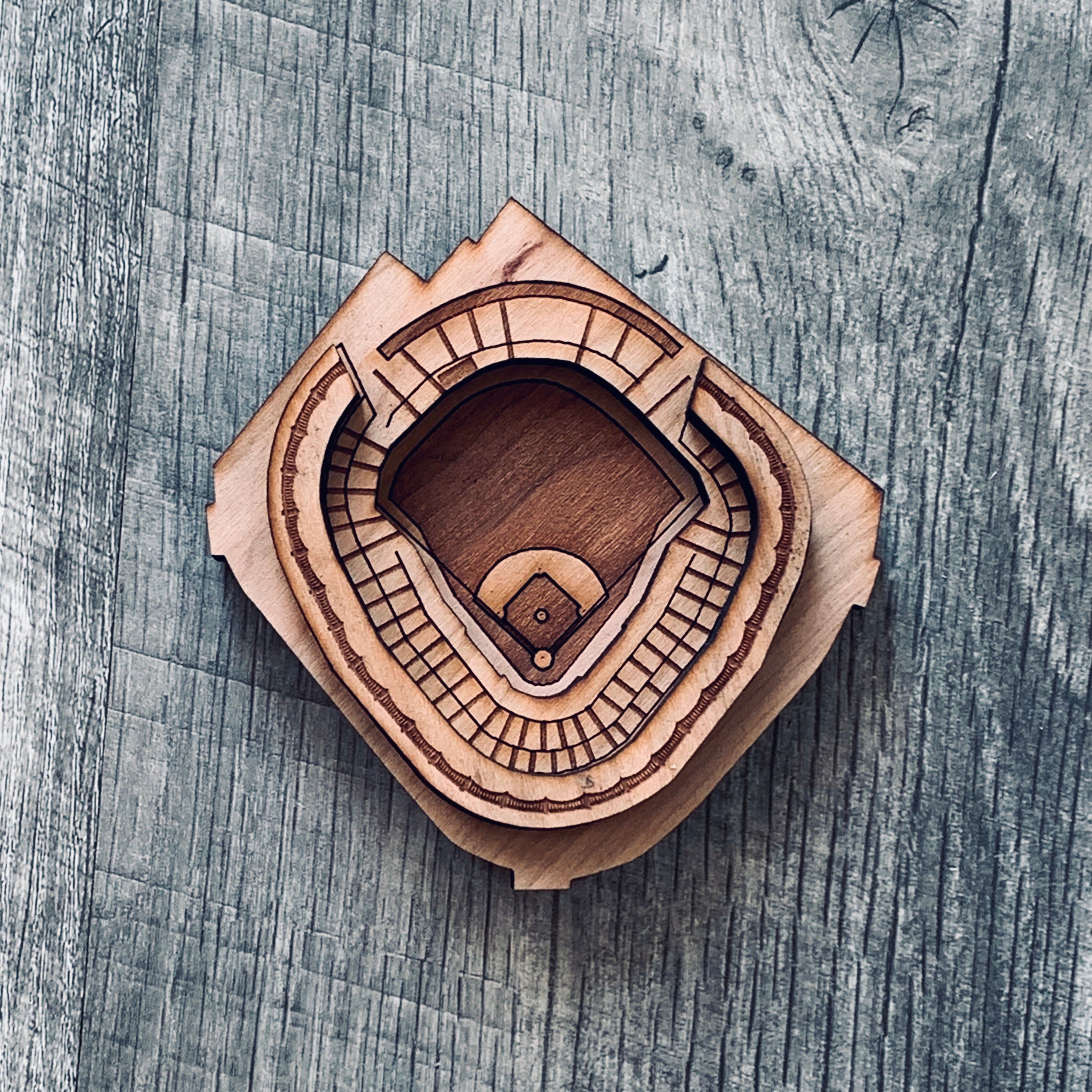 A set of Ballpark Magnets made from cherry hardwood, featuring strong ceramic magnets, displayed in an engraved craft gift box.