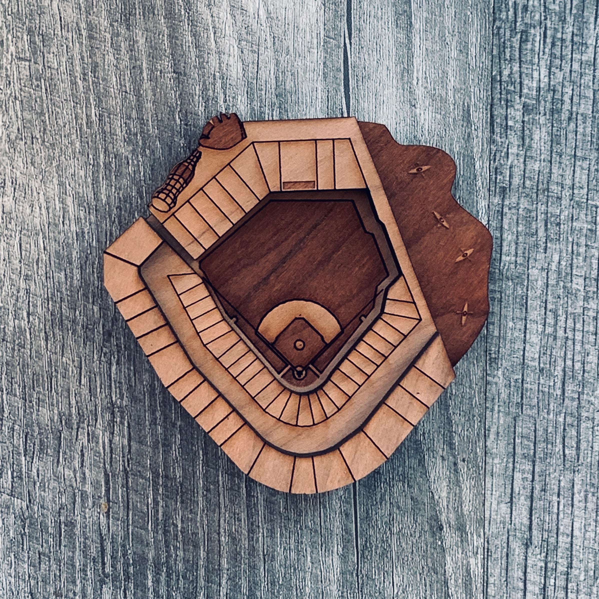 A set of Ballpark Magnets made from cherry hardwood, featuring strong ceramic magnets, displayed in an engraved craft gift box.