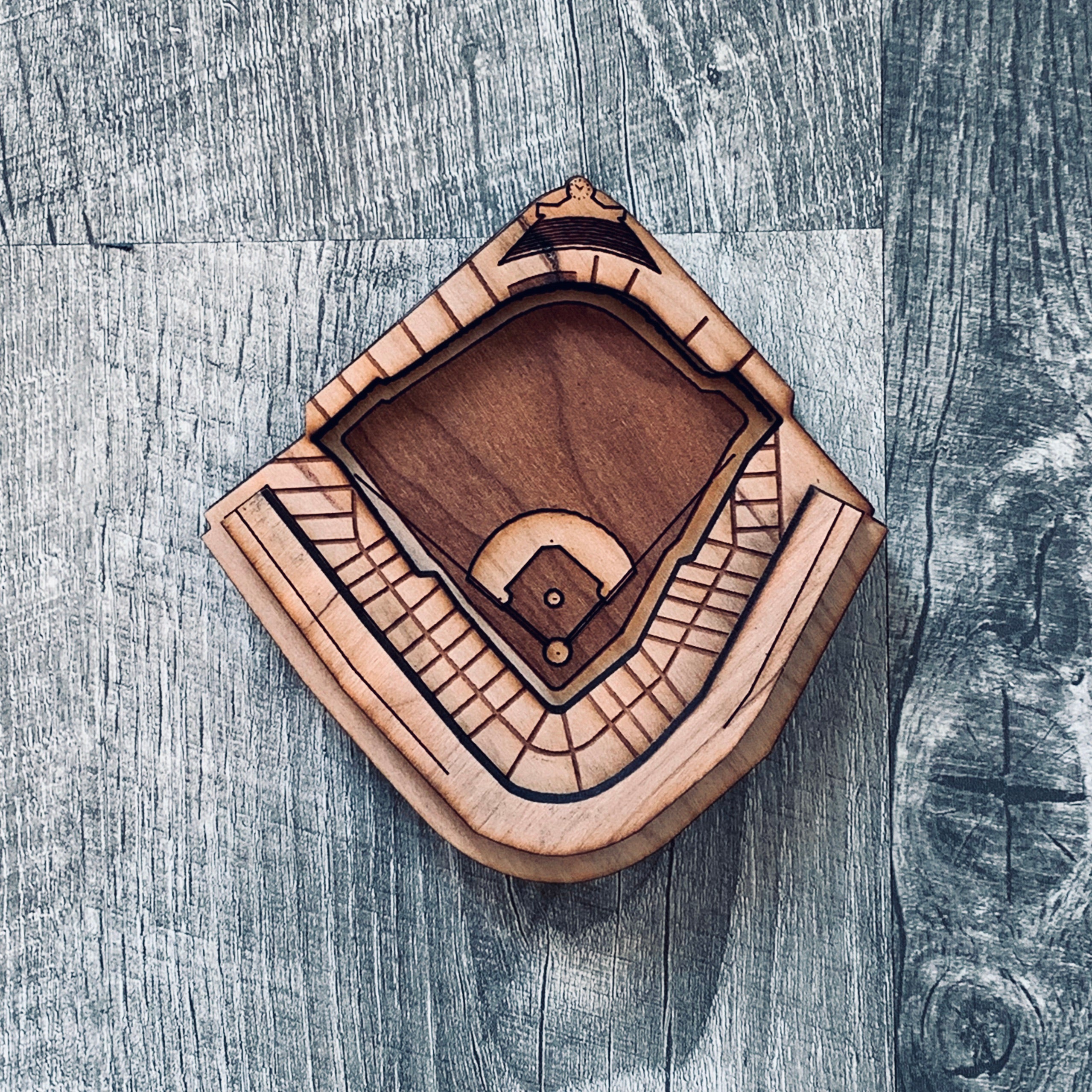 A set of Ballpark Magnets made from cherry hardwood, featuring strong ceramic magnets, displayed in an engraved craft gift box.