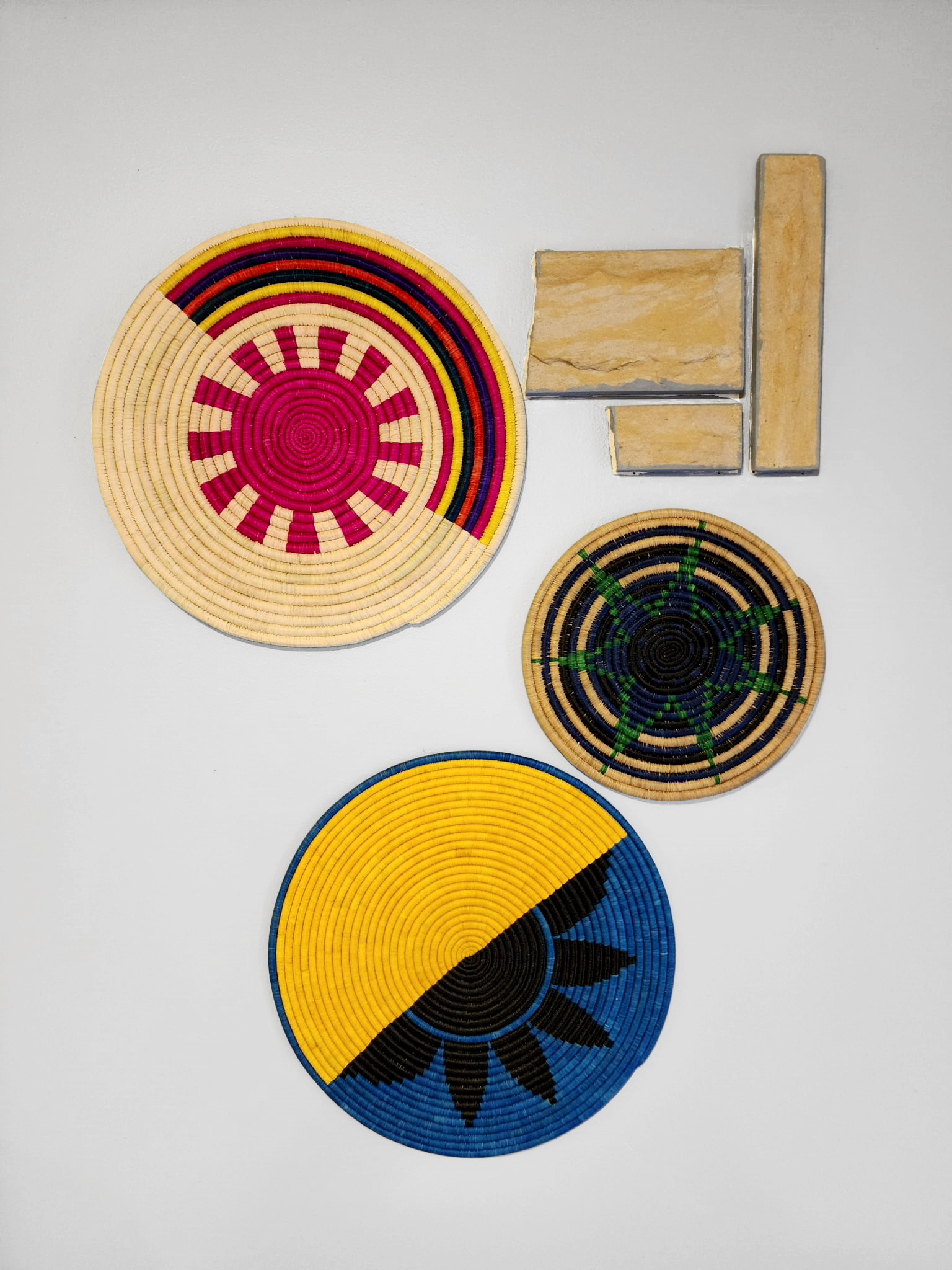 Banff Handcrafted Wall Disc/Trivet showcasing authentic African weaving design with vibrant colors and unique patterns.