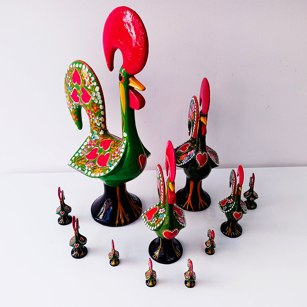 A colorful Barcelos Rooster, handmade from metallic league with intricate hand-painted designs, symbolizing Portuguese culture.