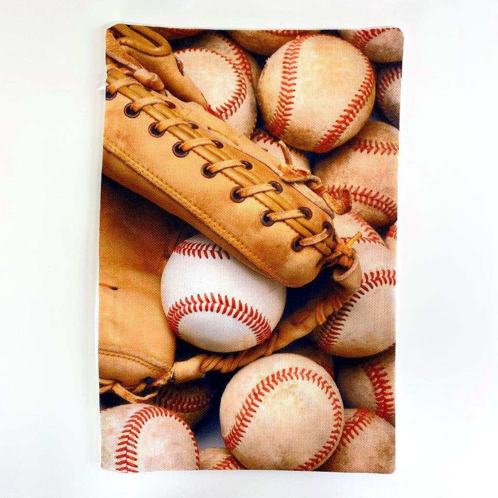 A collection of handcrafted baseball throw pillows featuring glove designs, showcasing crisp graphics and soft fabrics.