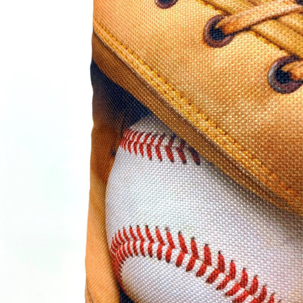 A collection of handcrafted baseball throw pillows featuring glove designs, showcasing crisp graphics and soft fabrics.