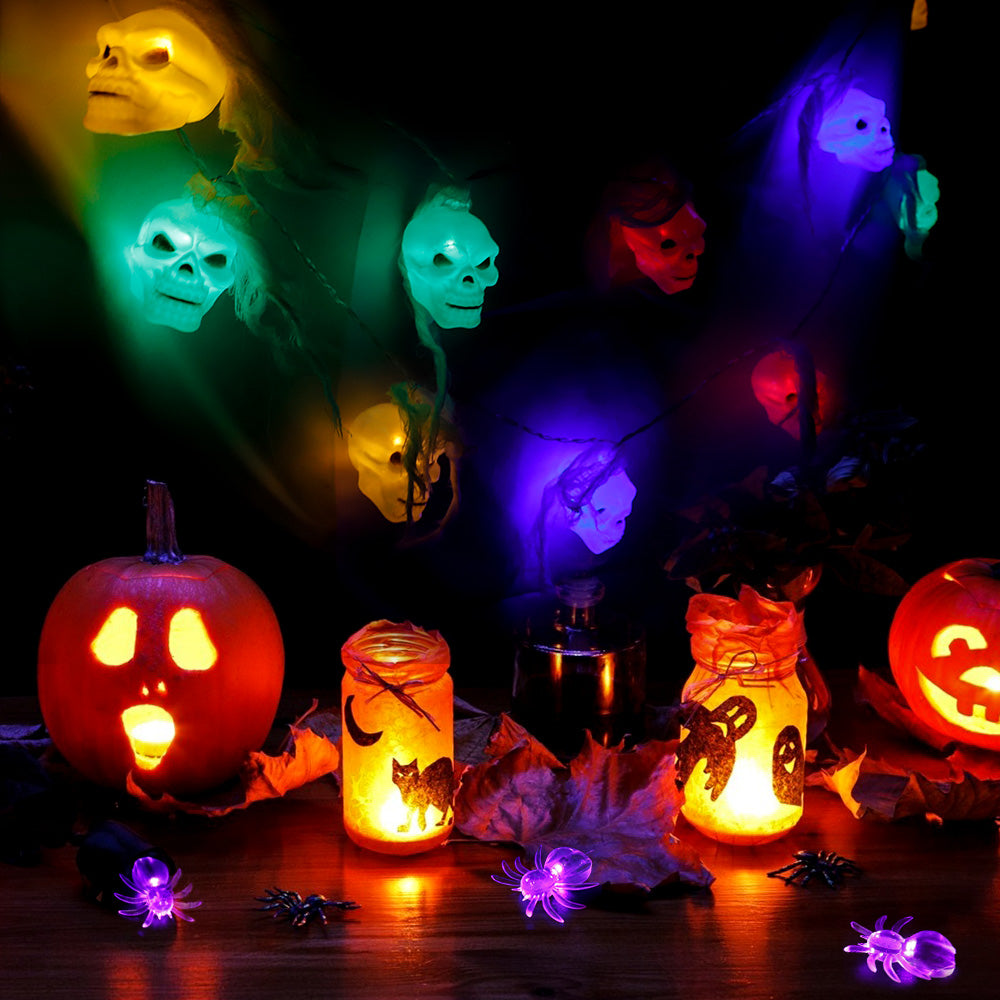 Battery Powered Halloween Ghost Skull Lights featuring 12 LED skulls on a 6-foot string, perfect for spooky decorations.