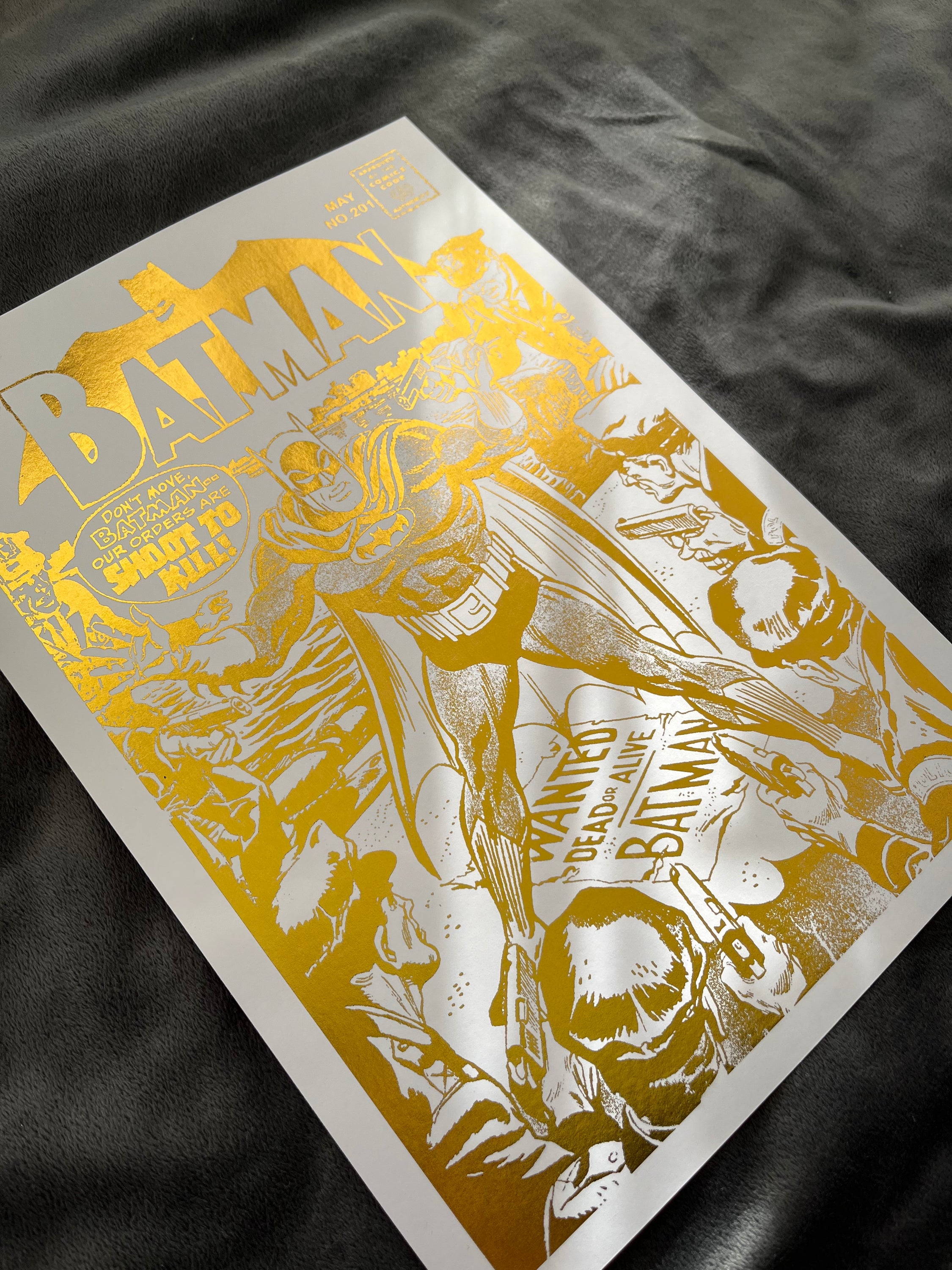 Batman Comic Cover Foil Print Gold featuring the Dark Knight in a striking design with gold foil accents.