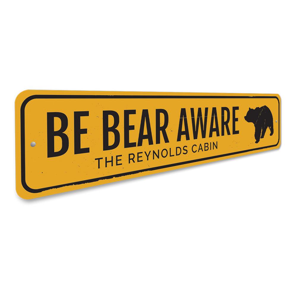 Be Bear Aware Sign made of durable aluminum, featuring a unique design perfect for lakehouse decor.