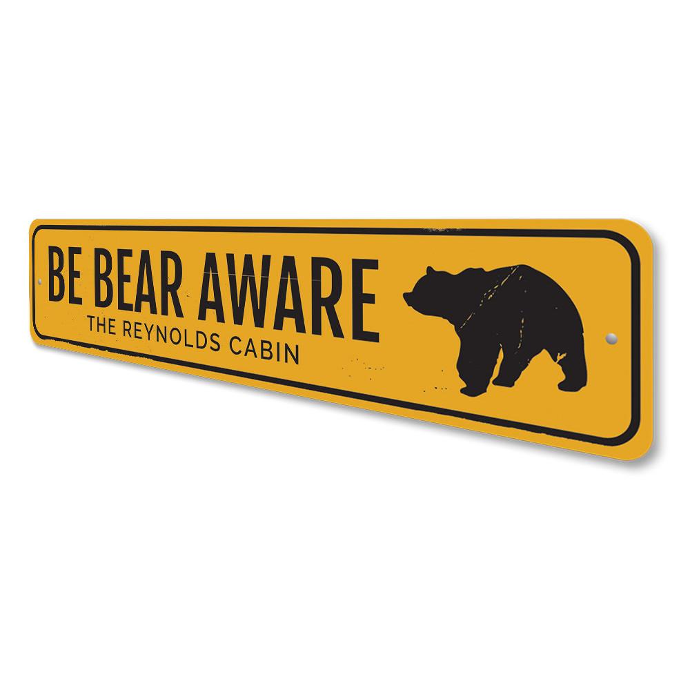 Be Bear Aware Sign made of durable aluminum, featuring a unique design perfect for lakehouse decor.