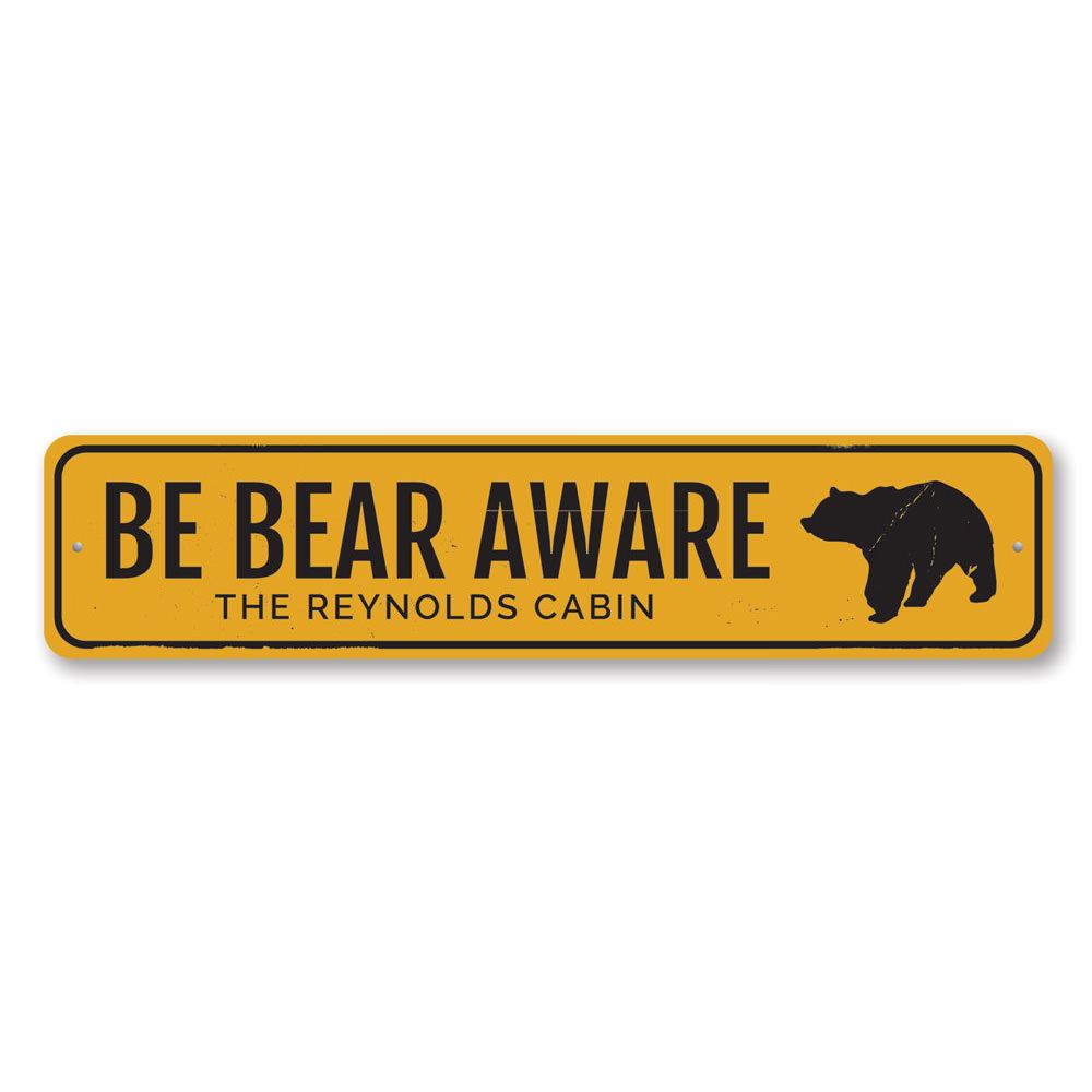 Be Bear Aware Sign made of durable aluminum, featuring a unique design perfect for lakehouse decor.