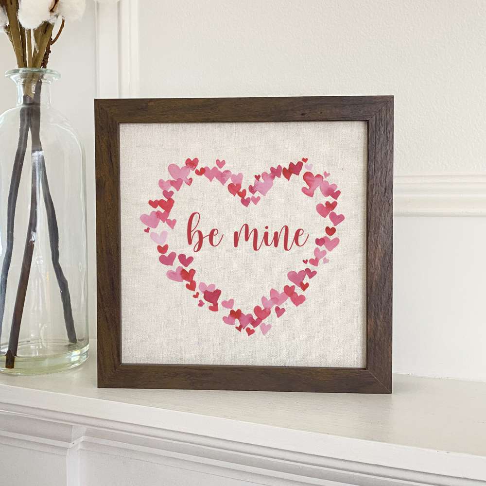 Be Mine Framed Sign with a stylish wood frame and linen-look background, perfect for home decor.