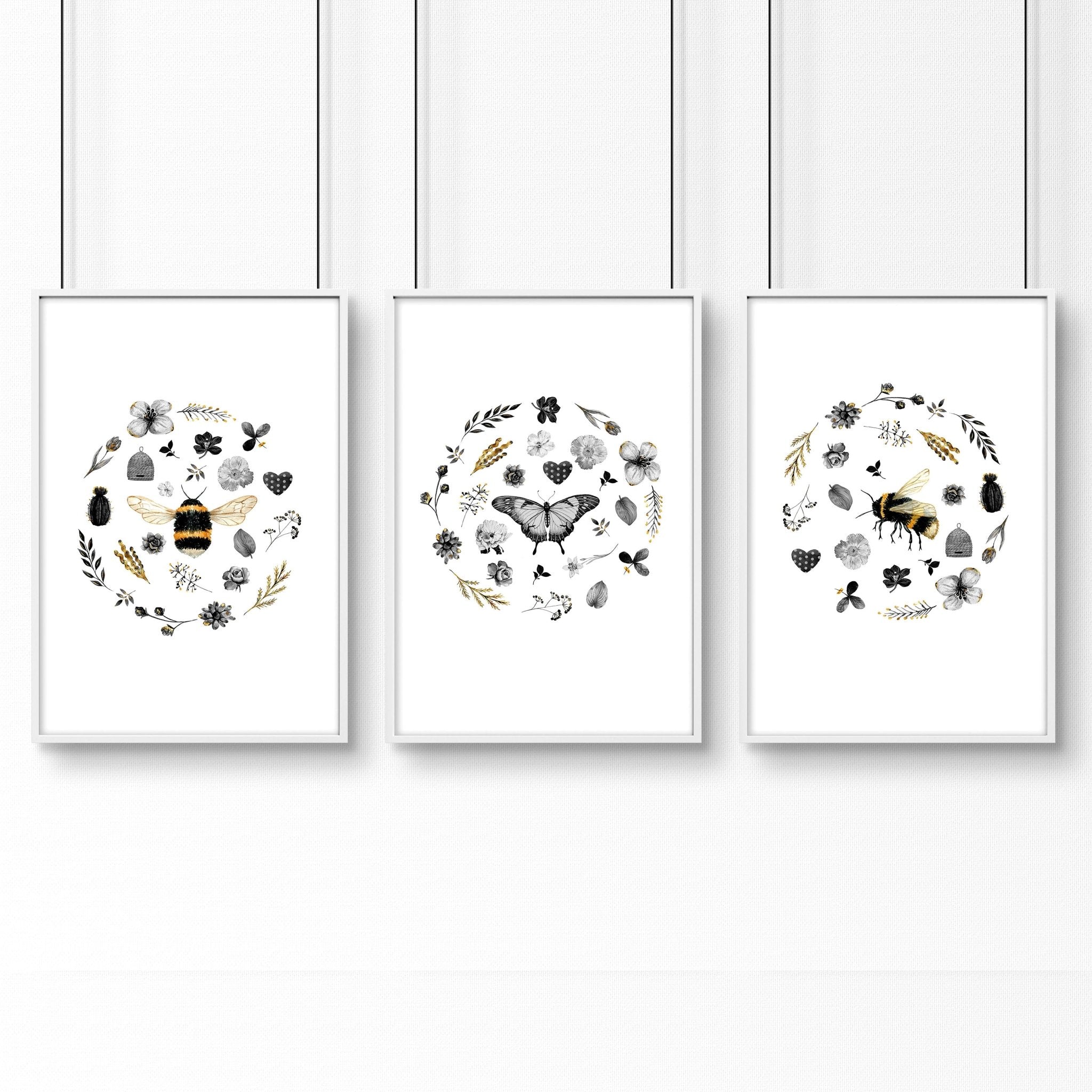 A set of 3 bee-themed wall art prints showcasing intricate designs and vibrant colors, perfect for entryway decor.