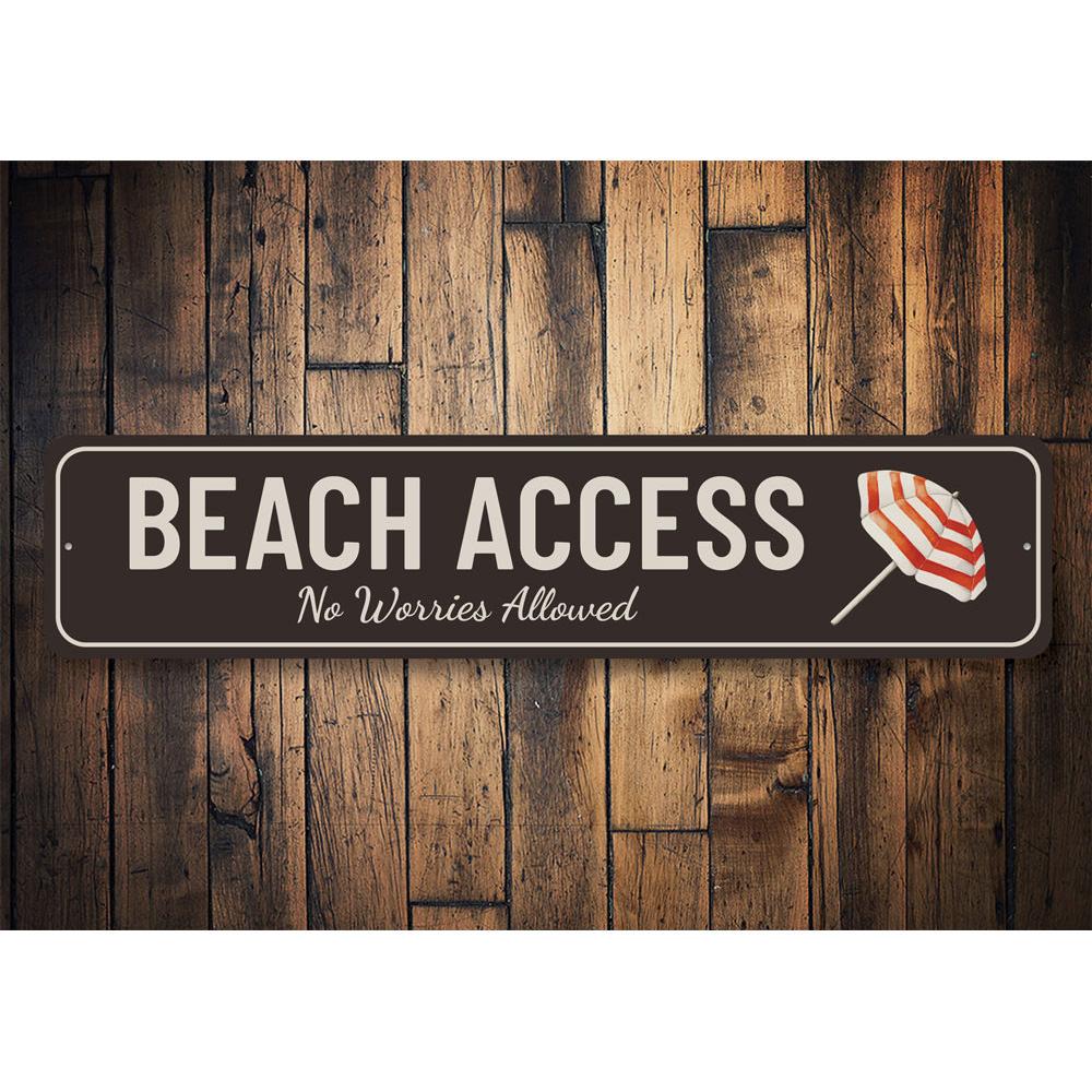 A decorative Beach Access Sign made from high-quality aluminum, featuring customizable text and pre-drilled holes for easy mounting.