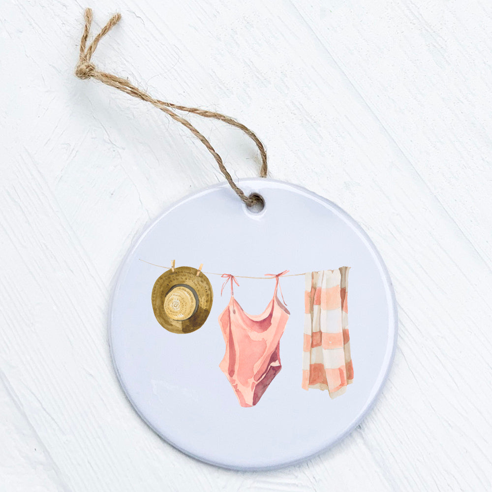 A beautifully crafted porcelain ornament featuring original beach-themed designs, perfect for gifting or home decor.