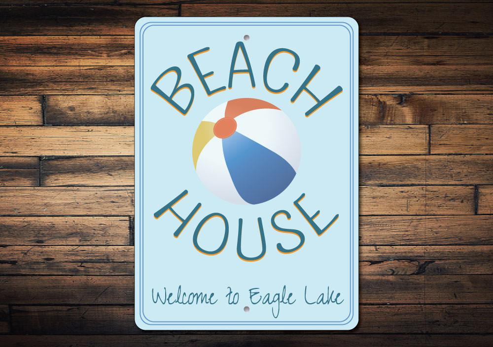 Colorful Beach Ball Sign made of durable aluminum, featuring customizable text options for personalized decor.