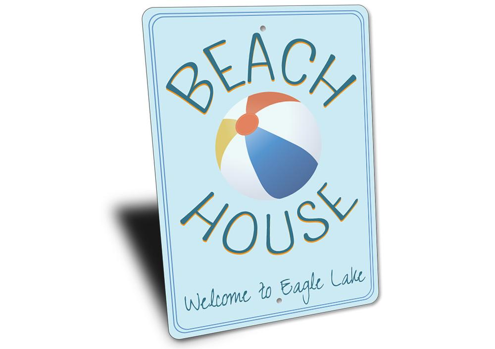 Colorful Beach Ball Sign made of durable aluminum, featuring customizable text options for personalized decor.