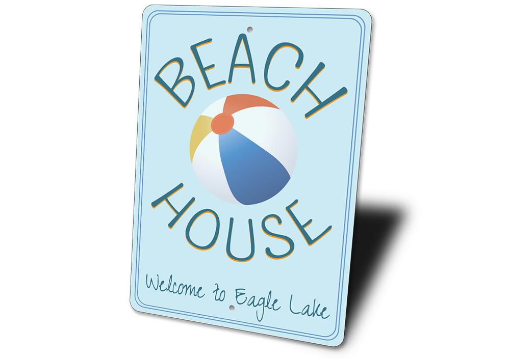 Colorful Beach Ball Sign made of durable aluminum, featuring customizable text options for personalized decor.