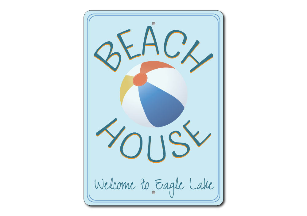 Colorful Beach Ball Sign made of durable aluminum, featuring customizable text options for personalized decor.