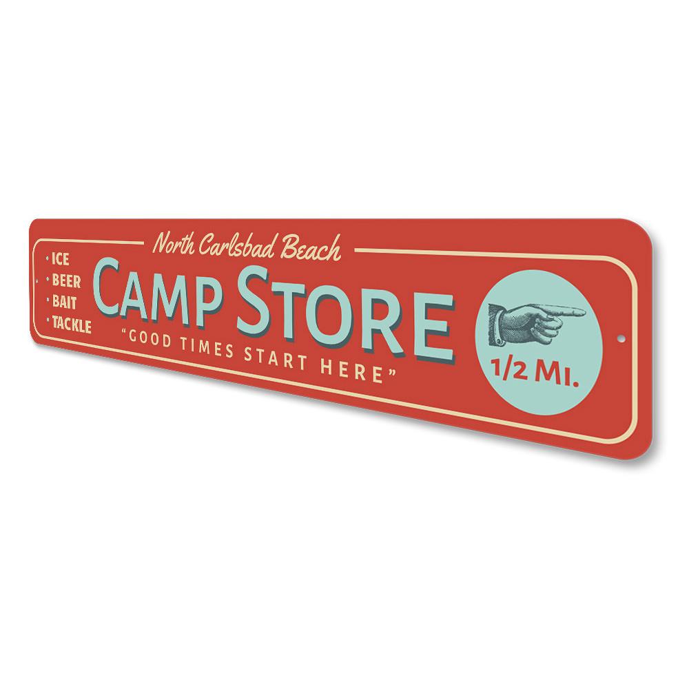 A decorative Beach Camp Store Sign made of high-quality aluminum, featuring customizable text and pre-drilled holes for easy mounting.