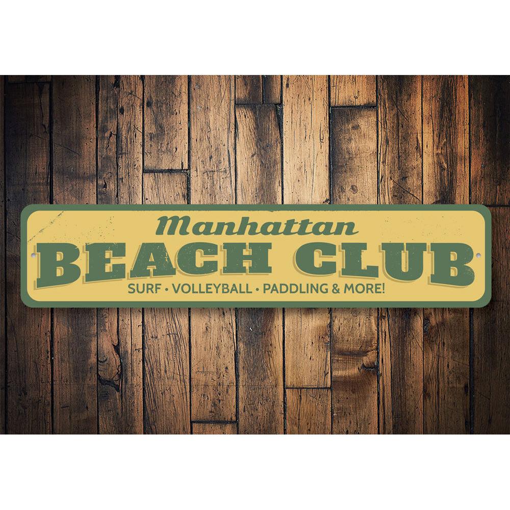 A beautifully crafted Beach Club Sign made of aluminum, featuring customizable text and a coastal design, perfect for beach houses and outdoor decor.