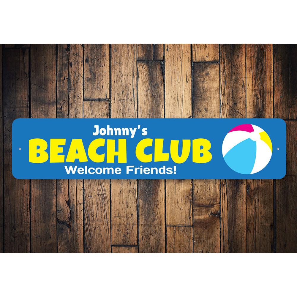 A decorative Beach Club Welcome Sign made of high-quality aluminum, featuring customizable text and a coastal design, perfect for home decor.