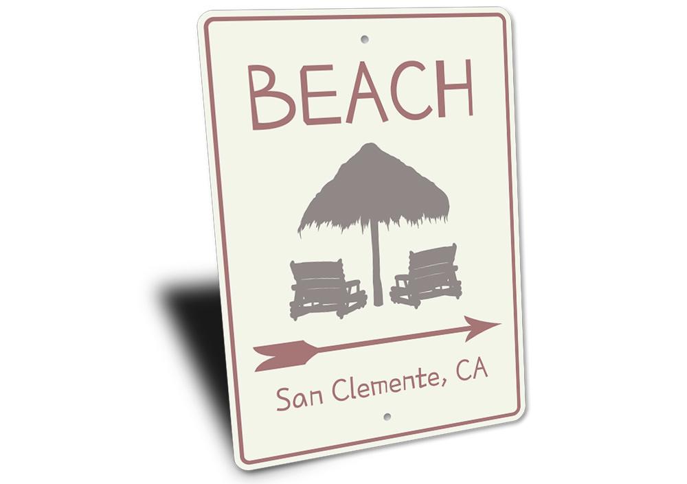 Beach Directional Arrow Sign made of aluminum, featuring customizable text and pre-drilled holes for easy mounting.