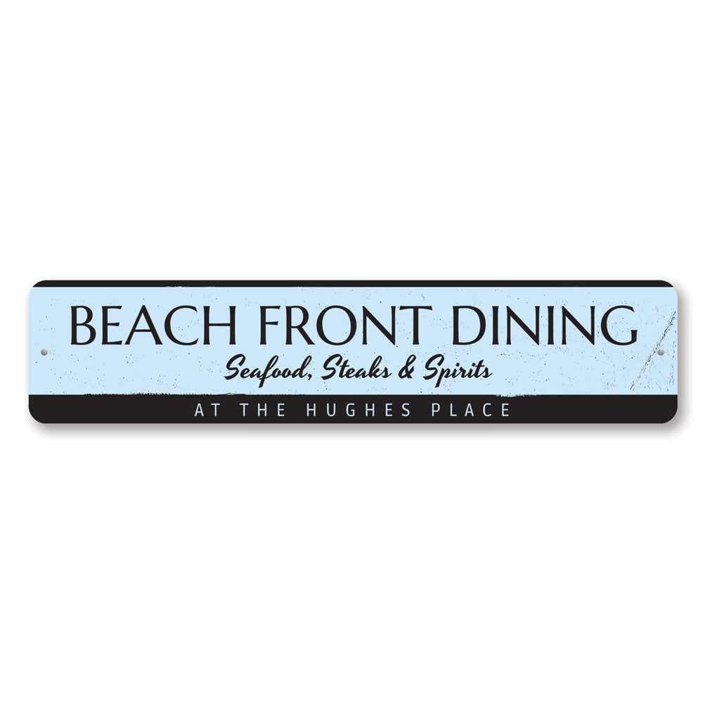 A decorative Beach Front Dining Sign made of high-quality aluminum, featuring a coastal design perfect for beach houses and seafood restaurants.