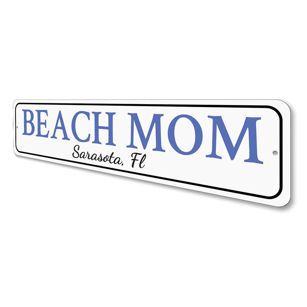 A decorative Beach Mom Sign made of high-quality aluminum, featuring customizable text and pre-drilled holes for easy mounting.