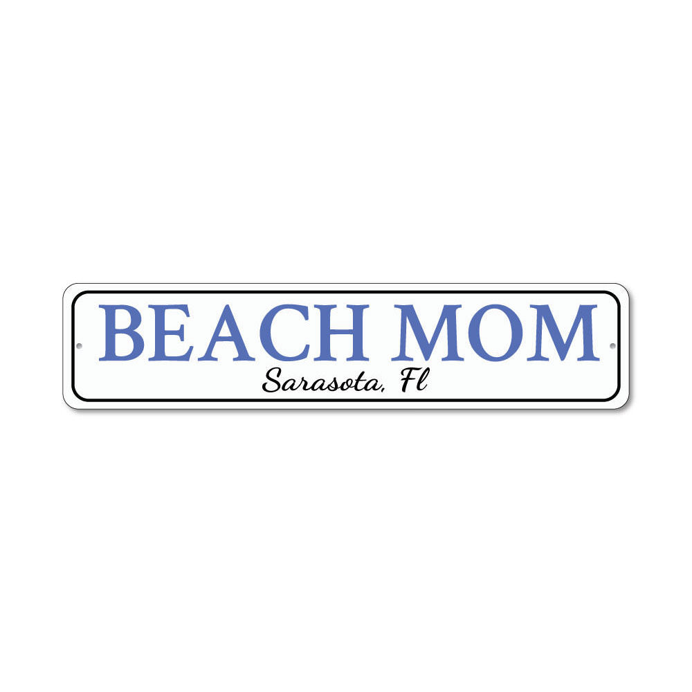 A decorative Beach Mom Sign made of high-quality aluminum, featuring customizable text and pre-drilled holes for easy mounting.