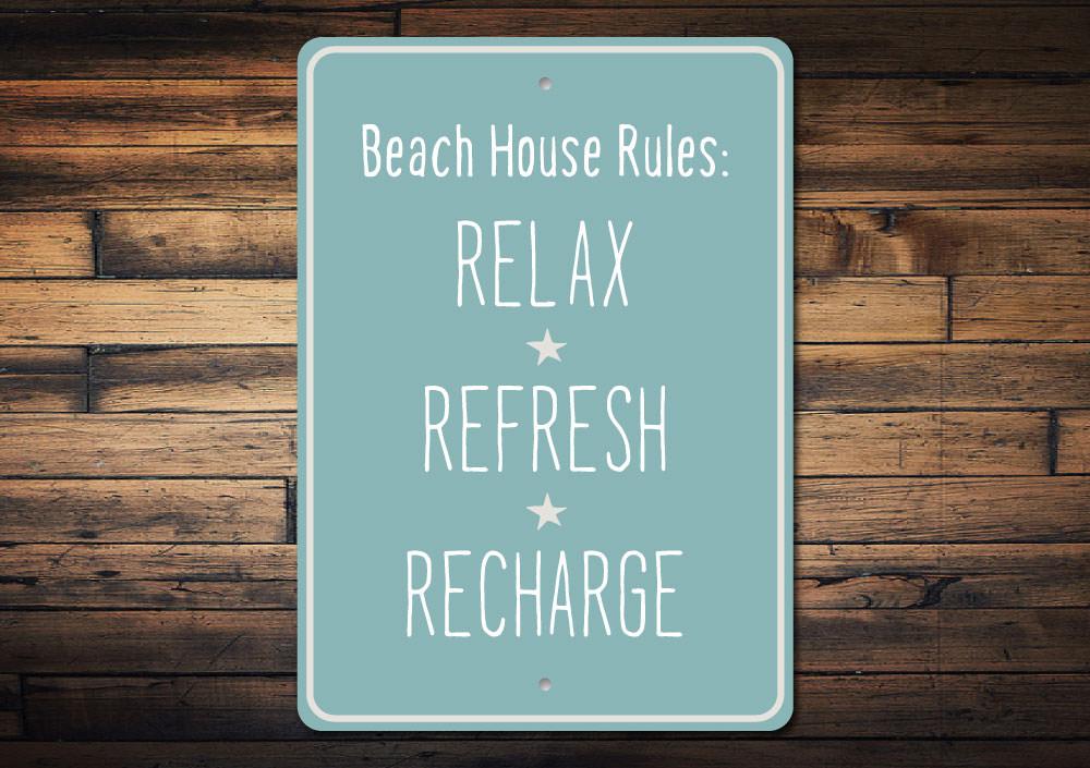 A decorative Beach Relax Sign made of high-quality aluminum, featuring a coastal theme, perfect for beach houses and outdoor spaces.