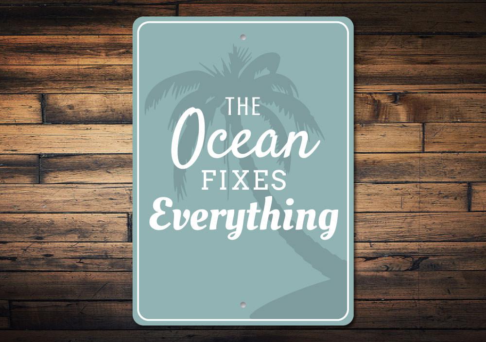 A decorative Beach Saying Sign made of high-quality aluminum, featuring beach-themed text and vibrant colors, perfect for coastal decor.