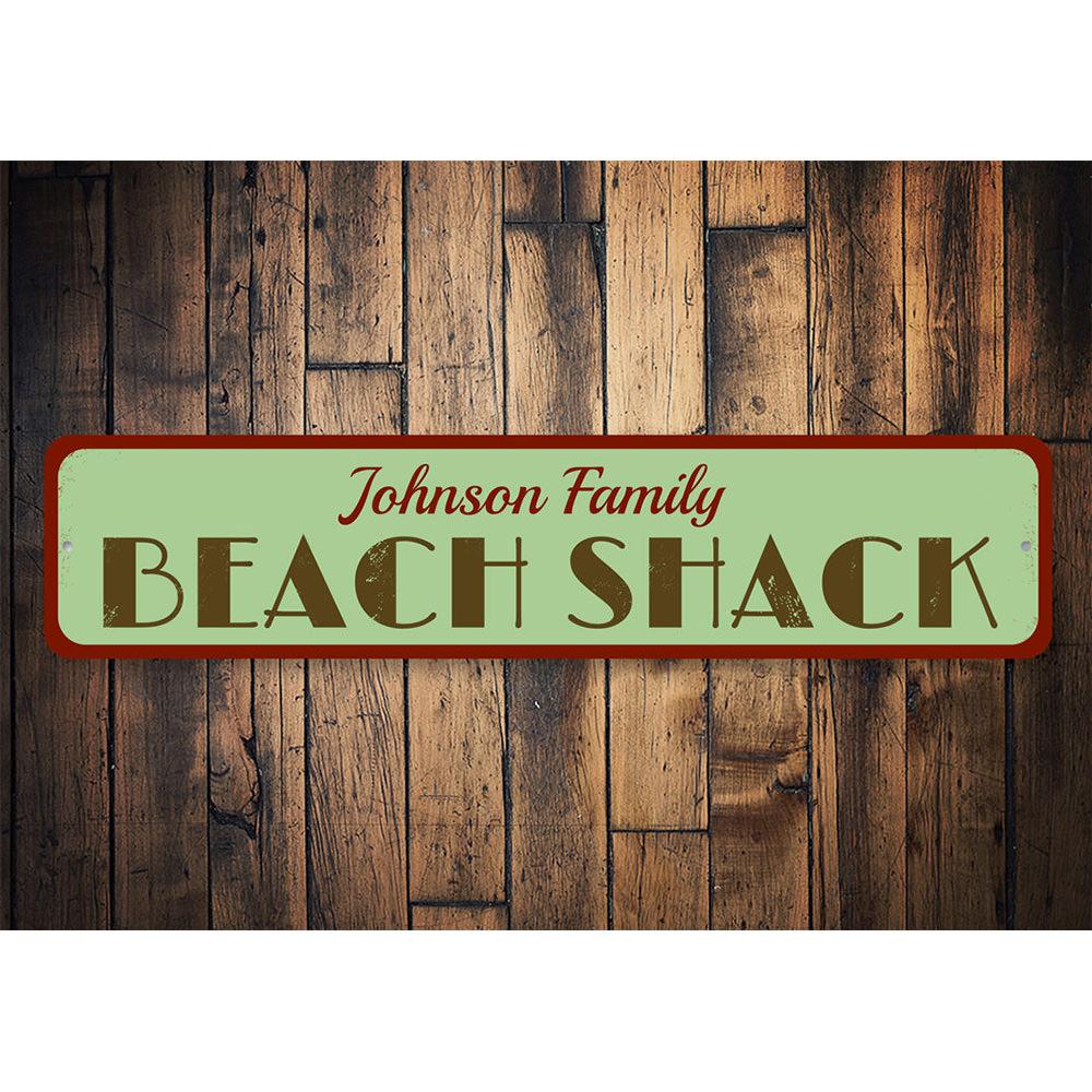 A vibrant Beach Shack Sign made of aluminum, featuring coastal-themed designs, perfect for beach houses and outdoor decor.