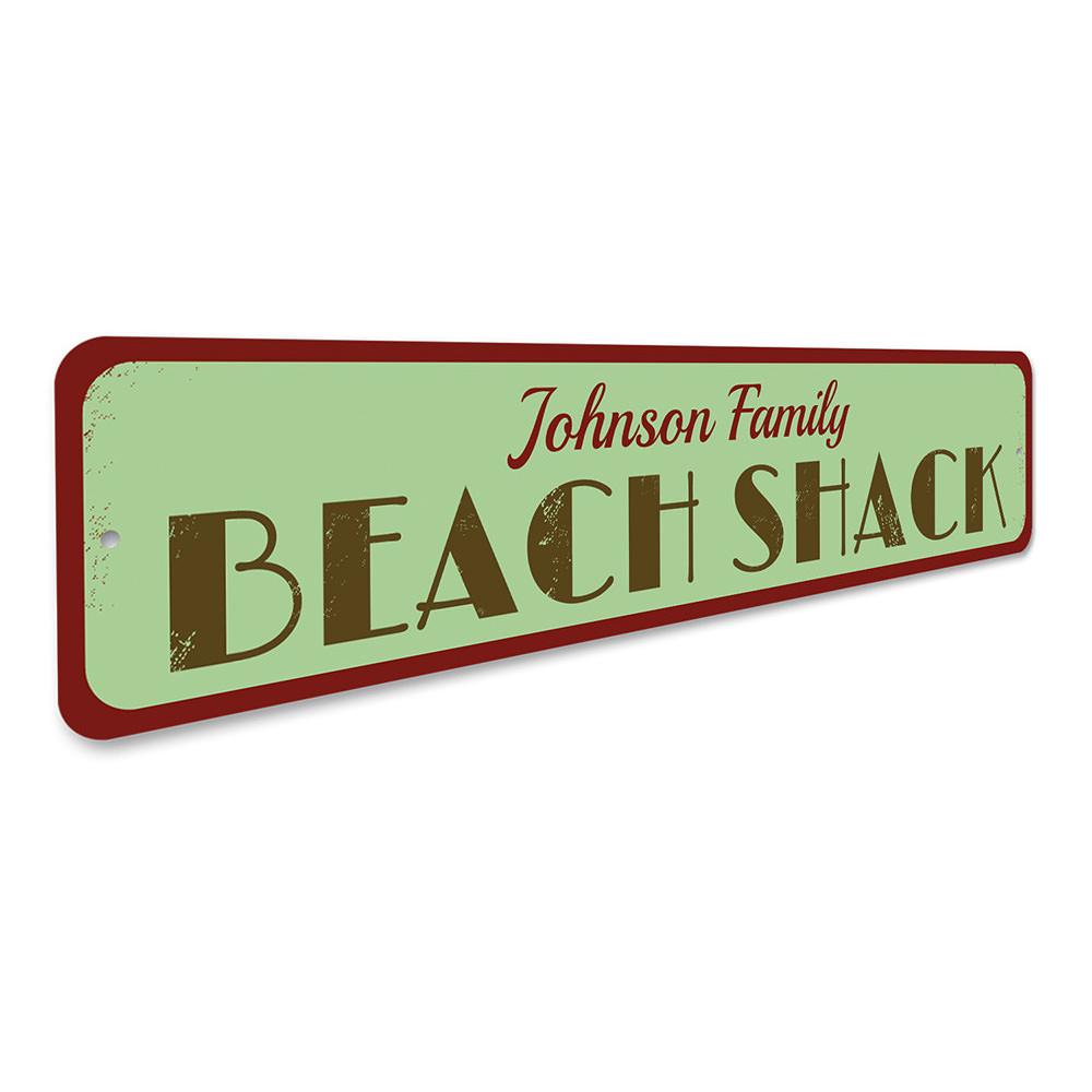 A vibrant Beach Shack Sign made of aluminum, featuring coastal-themed designs, perfect for beach houses and outdoor decor.