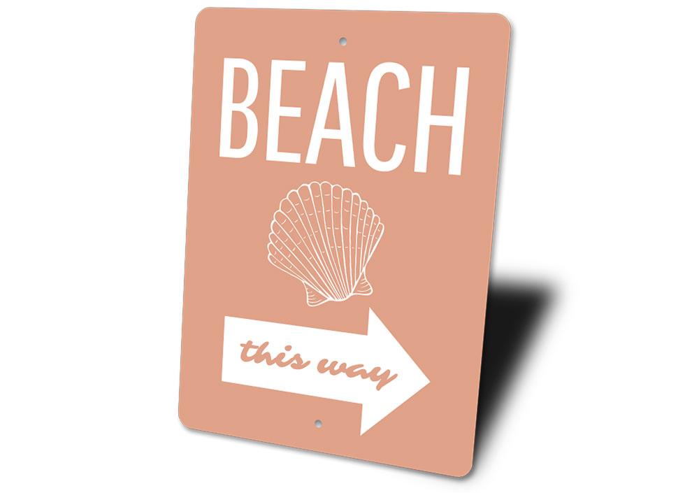 A decorative Beach Shell Sign made of high-quality aluminum, featuring a beautiful beach-themed design, perfect for coastal decor.