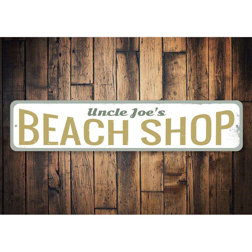 A vibrant Beach Shop Sign made of aluminum, featuring customizable text, perfect for coastal decor.