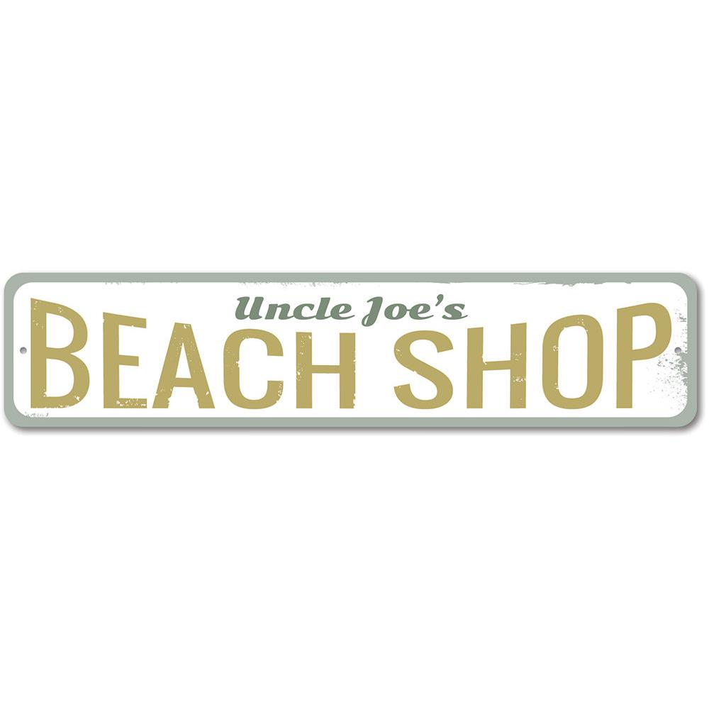 A vibrant Beach Shop Sign made of aluminum, featuring customizable text, perfect for coastal decor.