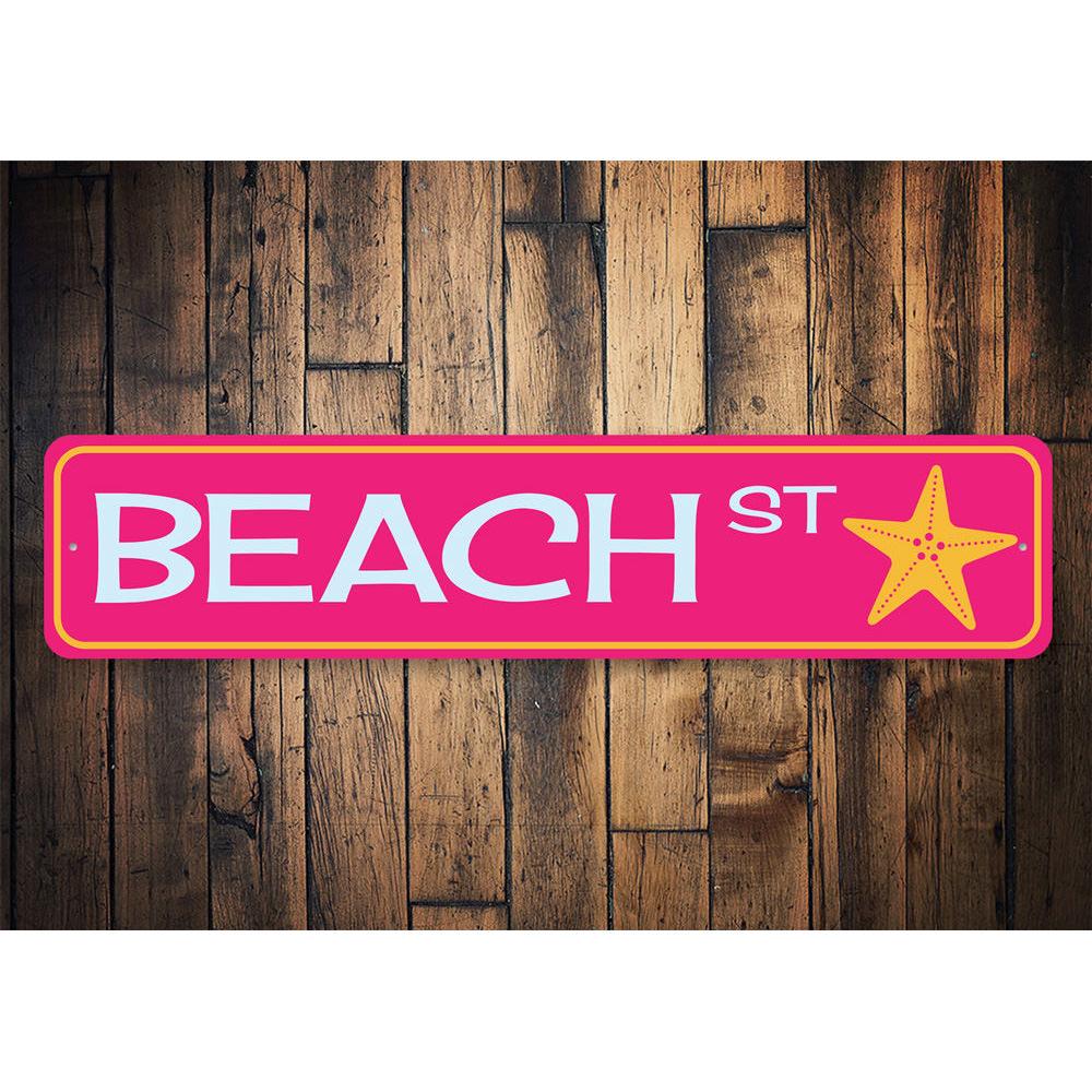 A decorative Beach Street Sign made of high-quality aluminum, featuring customizable text and a coastal design, perfect for beach houses.