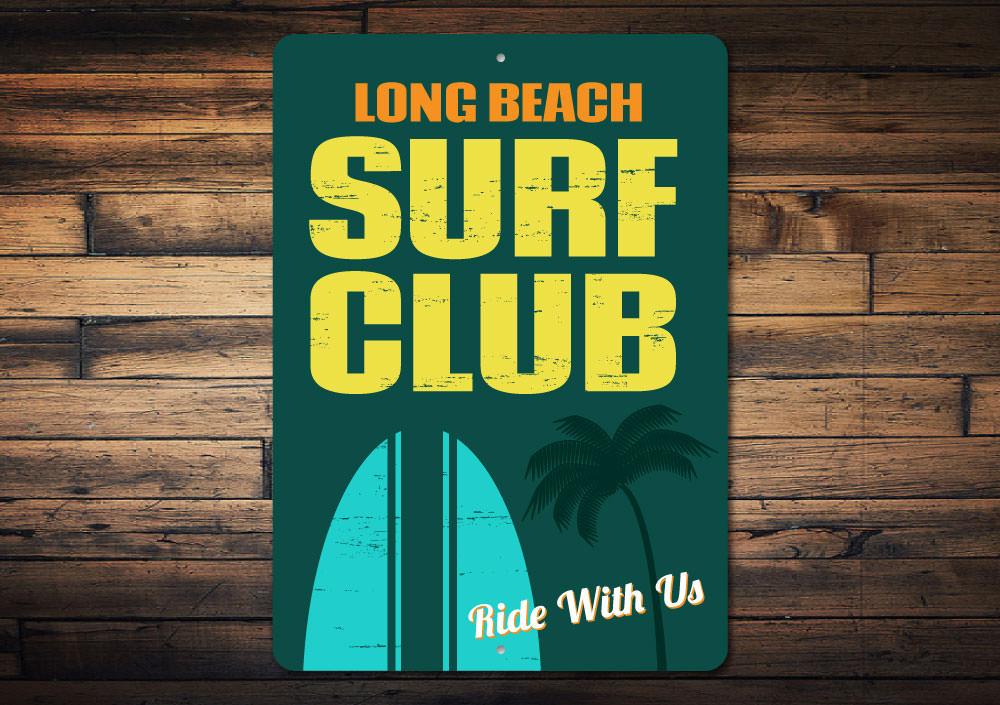 A decorative Beach Surf Club Sign made of high-quality aluminum, featuring customizable text and pre-drilled holes for easy mounting.