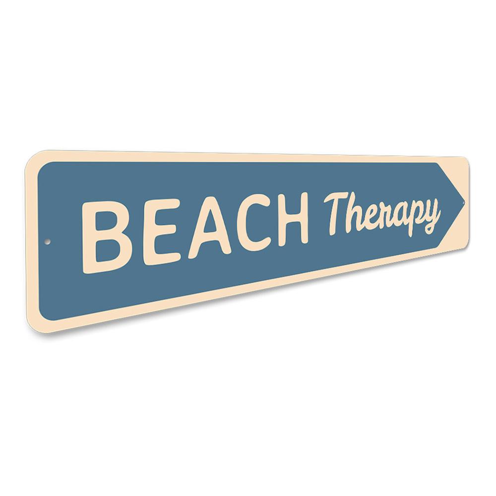 A decorative Beach Therapy Sign made of high-quality aluminum, featuring beach-themed graphics and customizable text, perfect for coastal decor.