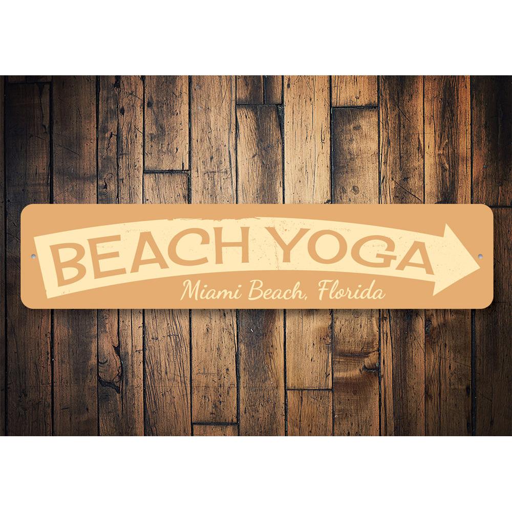 A decorative Beach Yoga Sign made of high-quality aluminum, featuring a serene beach theme, perfect for coastal decor.