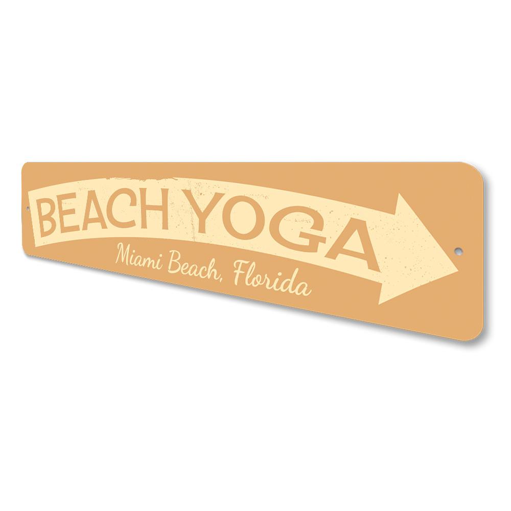 A decorative Beach Yoga Sign made of high-quality aluminum, featuring a serene beach theme, perfect for coastal decor.