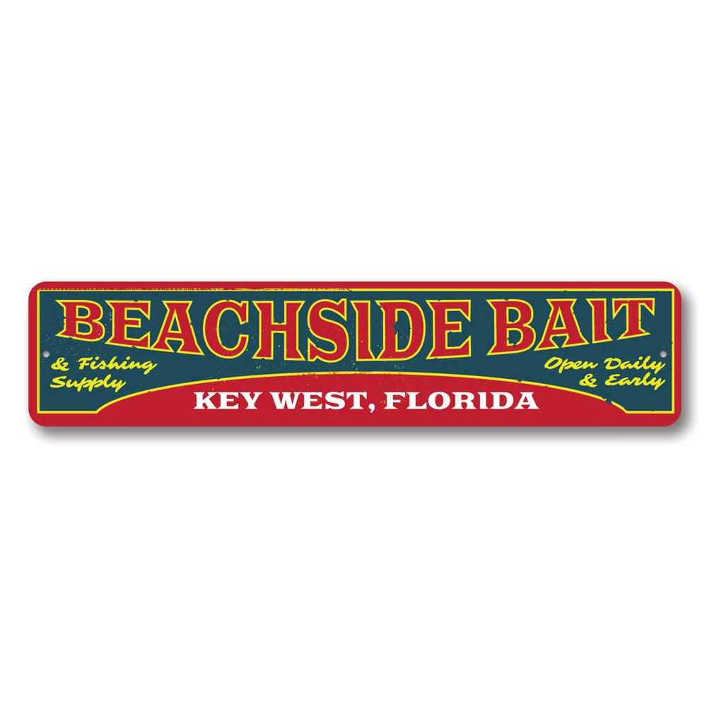 A decorative Beachside Bait Sign made of aluminum, featuring coastal-themed design elements, perfect for beach houses and restaurants.